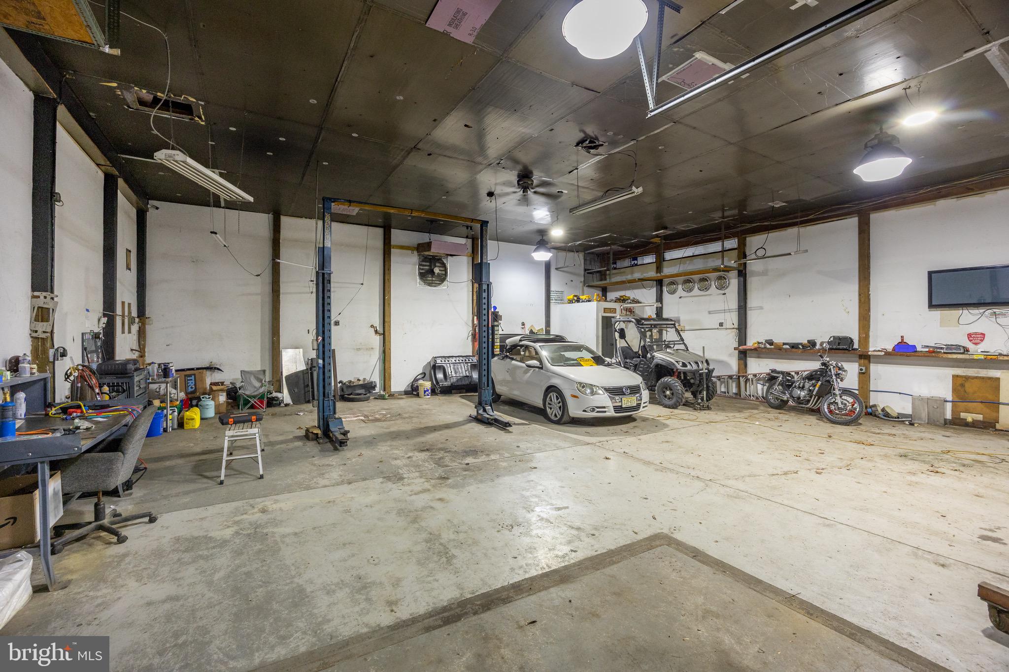 687 Jackson Road Atco, NJ 08004 - Photo 19 of 20 a view of a garage with cars