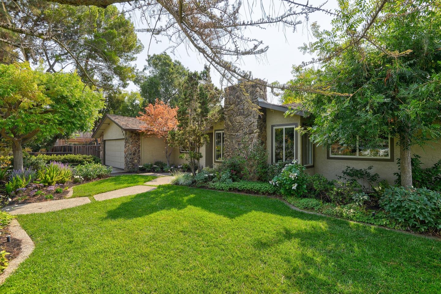 190 Pine Lane Los Altos, CA 94022 - Photo 2 of 30 a front view of a house with garden