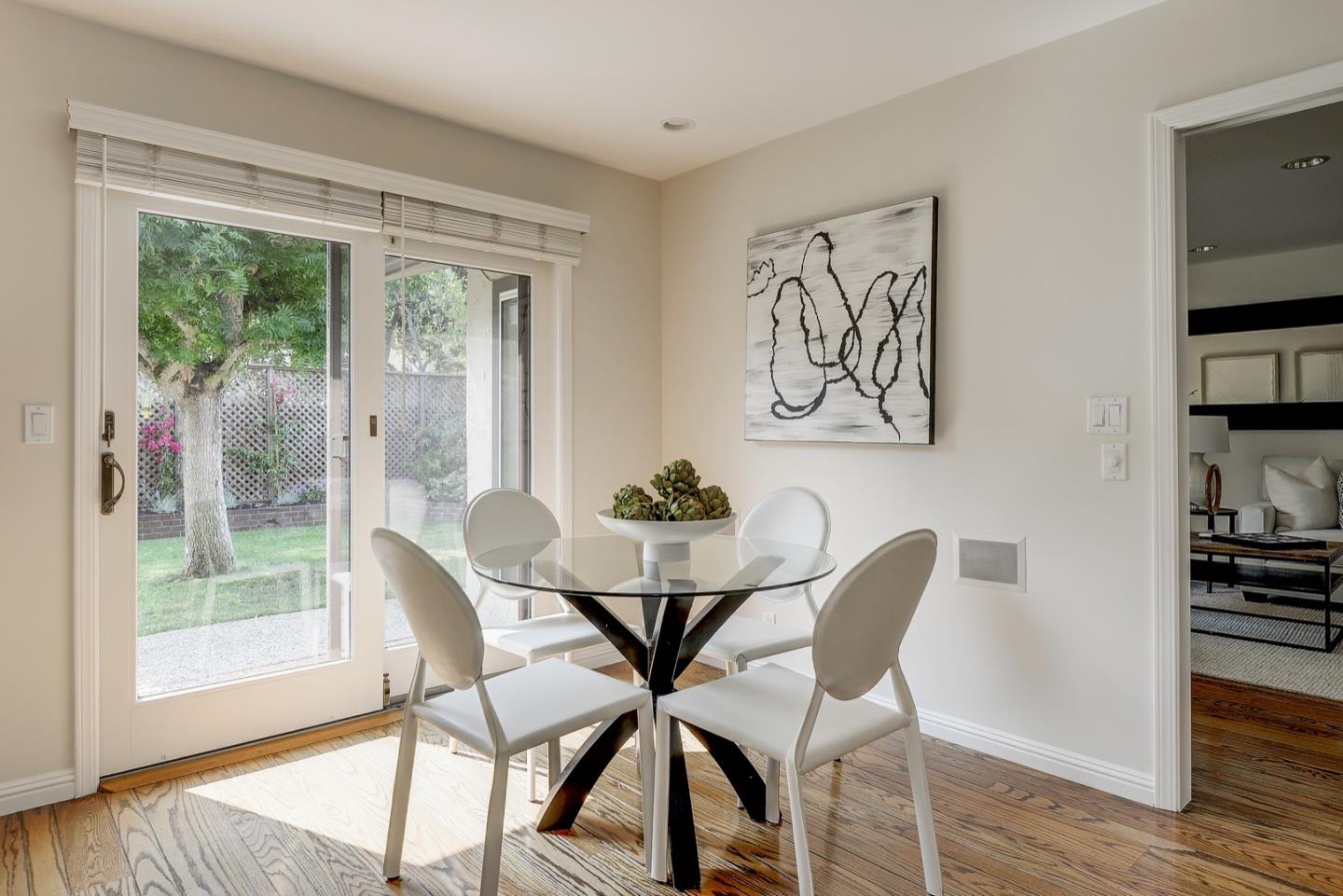190 Pine Lane Los Altos, CA 94022 - Photo 11 of 30 a view of a dining room with furniture window and wooden floor