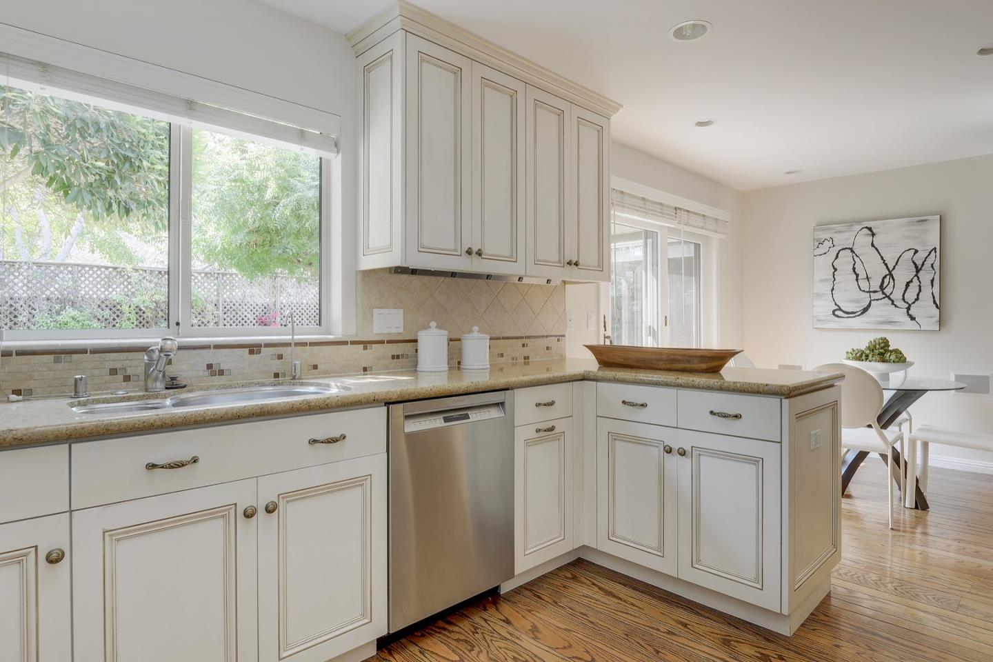 190 Pine Lane Los Altos, CA 94022 - Photo 14 of 30 a kitchen with a sink cabinets and window