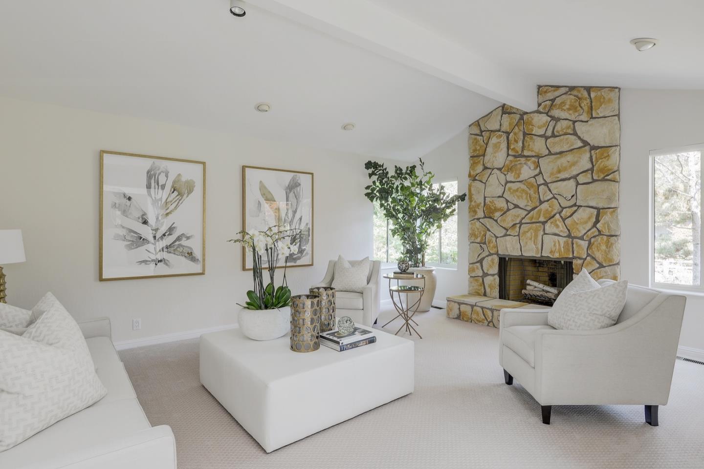 190 Pine Lane Los Altos, CA 94022 - Photo 3 of 30 a living room with furniture a fireplace and a potted plant