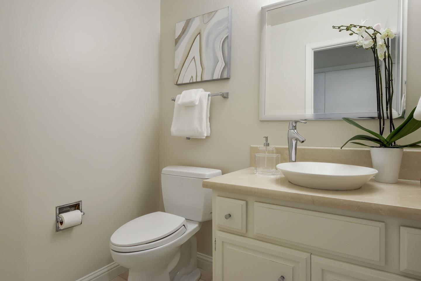 190 Pine Lane Los Altos, CA 94022 - Photo 21 of 30 a bathroom with a toilet sink and mirror