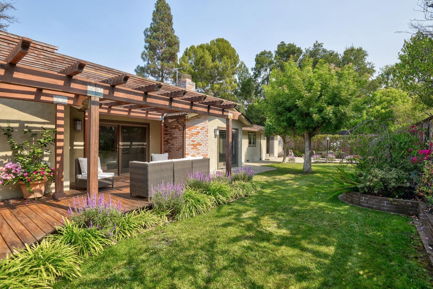 190 Pine Lane Los Altos, CA 94022 - Photo 26 of 30 front view of a house with a garden