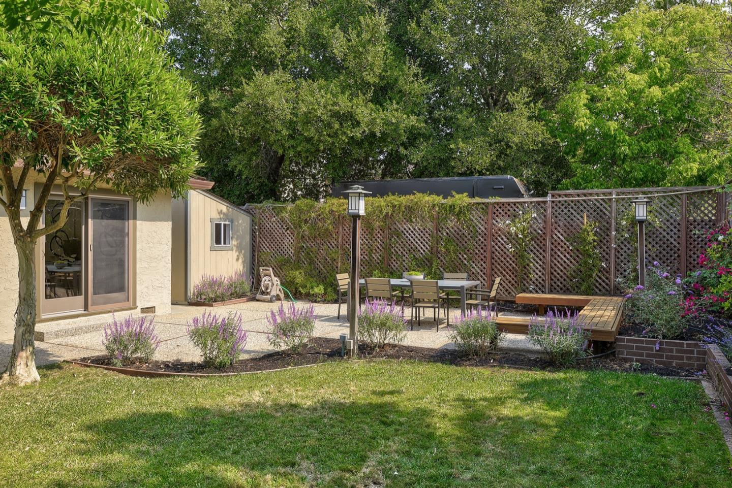 190 Pine Lane Los Altos, CA 94022 - Photo 30 of 30 a view of a chair and table in backyard of the house
