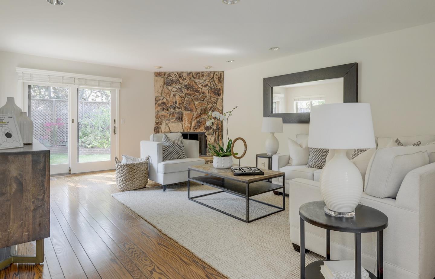 190 Pine Lane Los Altos, CA 94022 - Photo 5 of 30 a living room with furniture and a large window