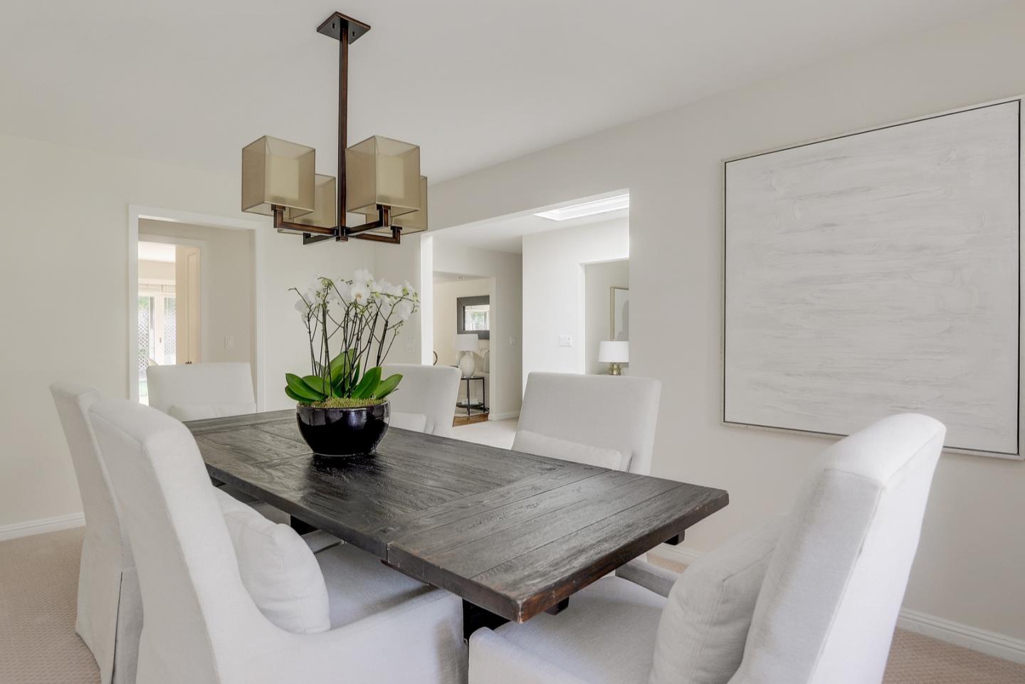 190 Pine Lane Los Altos, CA 94022 - Photo 7 of 30 a view of a dining room with furniture and wooden floor