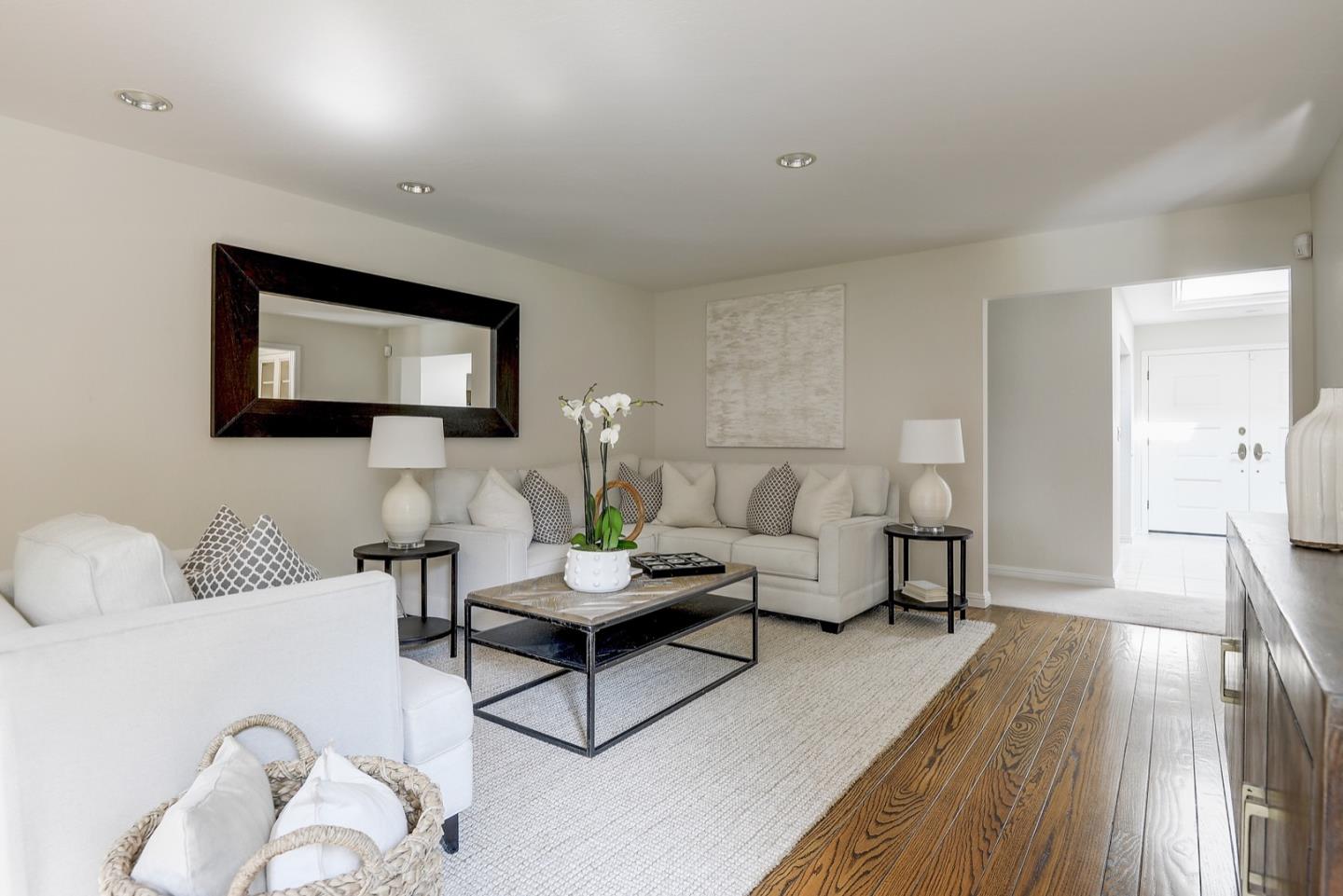 190 Pine Lane Los Altos, CA 94022 - Photo 8 of 30 a living room with furniture and a flat screen tv