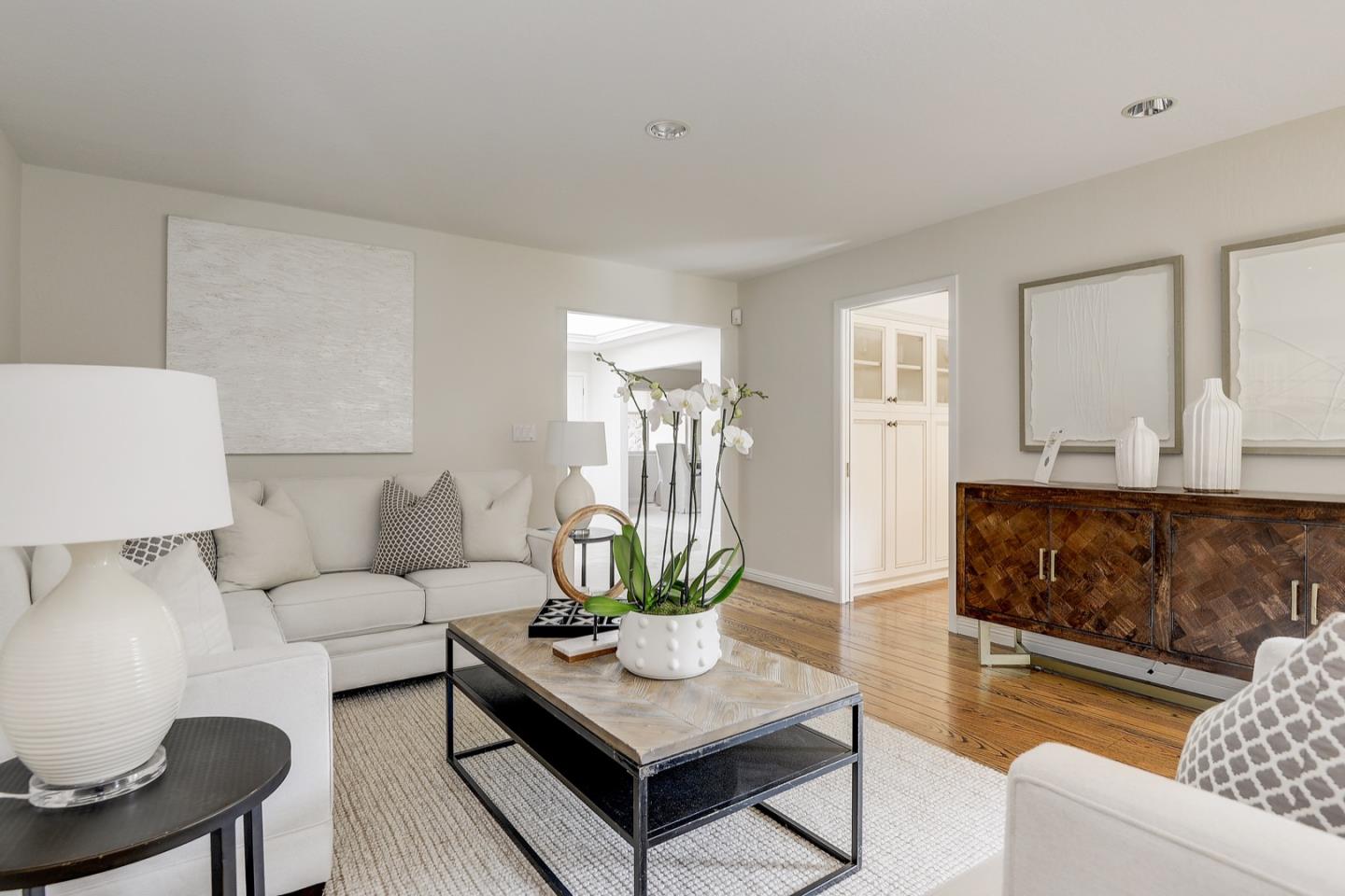 190 Pine Lane Los Altos, CA 94022 - Photo 9 of 30 a living room with furniture and a table