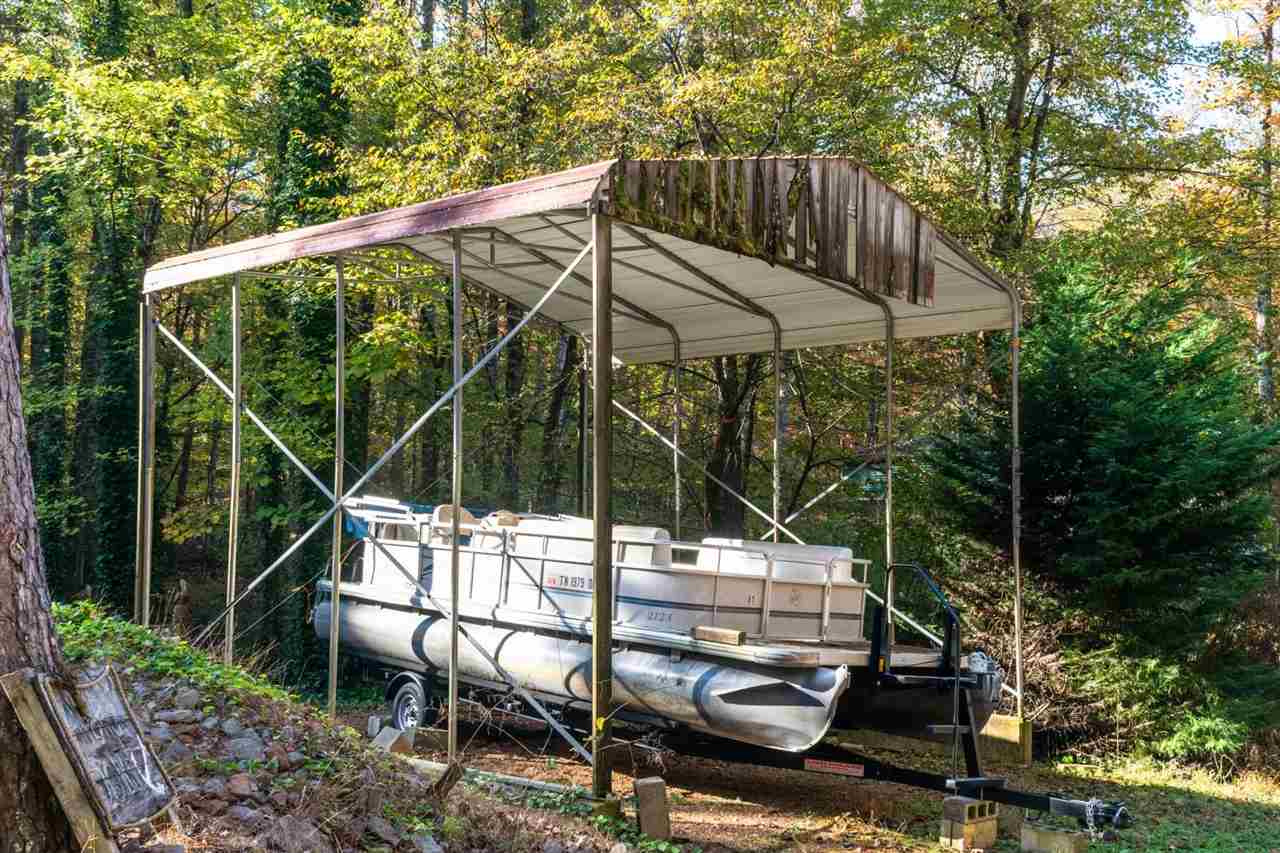 190 Micro Lane Counce, TN 38326 - Photo 2 of 25 a view of a chair and tables in the backyard