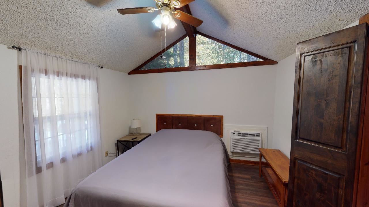 190 Micro Lane Counce, TN 38326 - Photo 19 of 25 a bedroom with a bed and a window