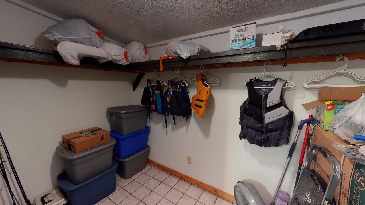 190 Micro Lane Counce, TN 38326 - Photo 21 of 25 a view of walk in closet with clothes and shoes
