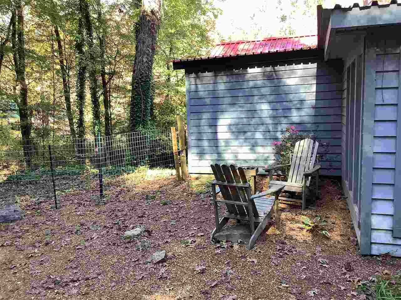 190 Micro Lane Counce, TN 38326 - Photo 23 of 25 a view of a chairs and table in the backyard