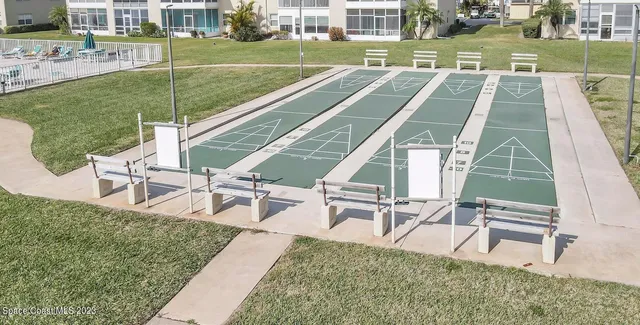 an aerial view of a house with outdoor space