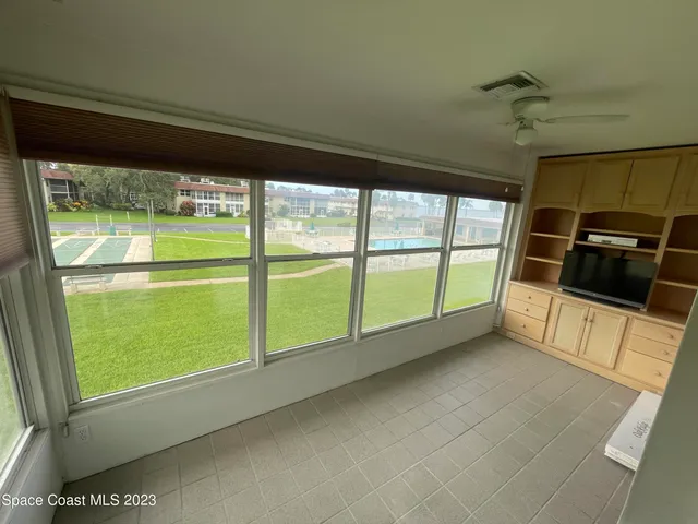 a view of a green field with clear sky