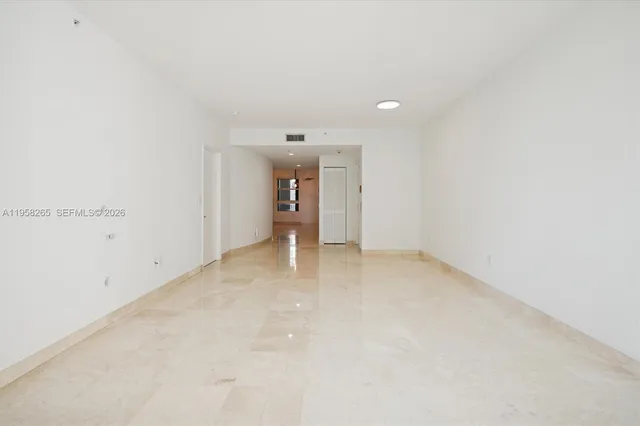 a kitchen with a sink cabinets and window