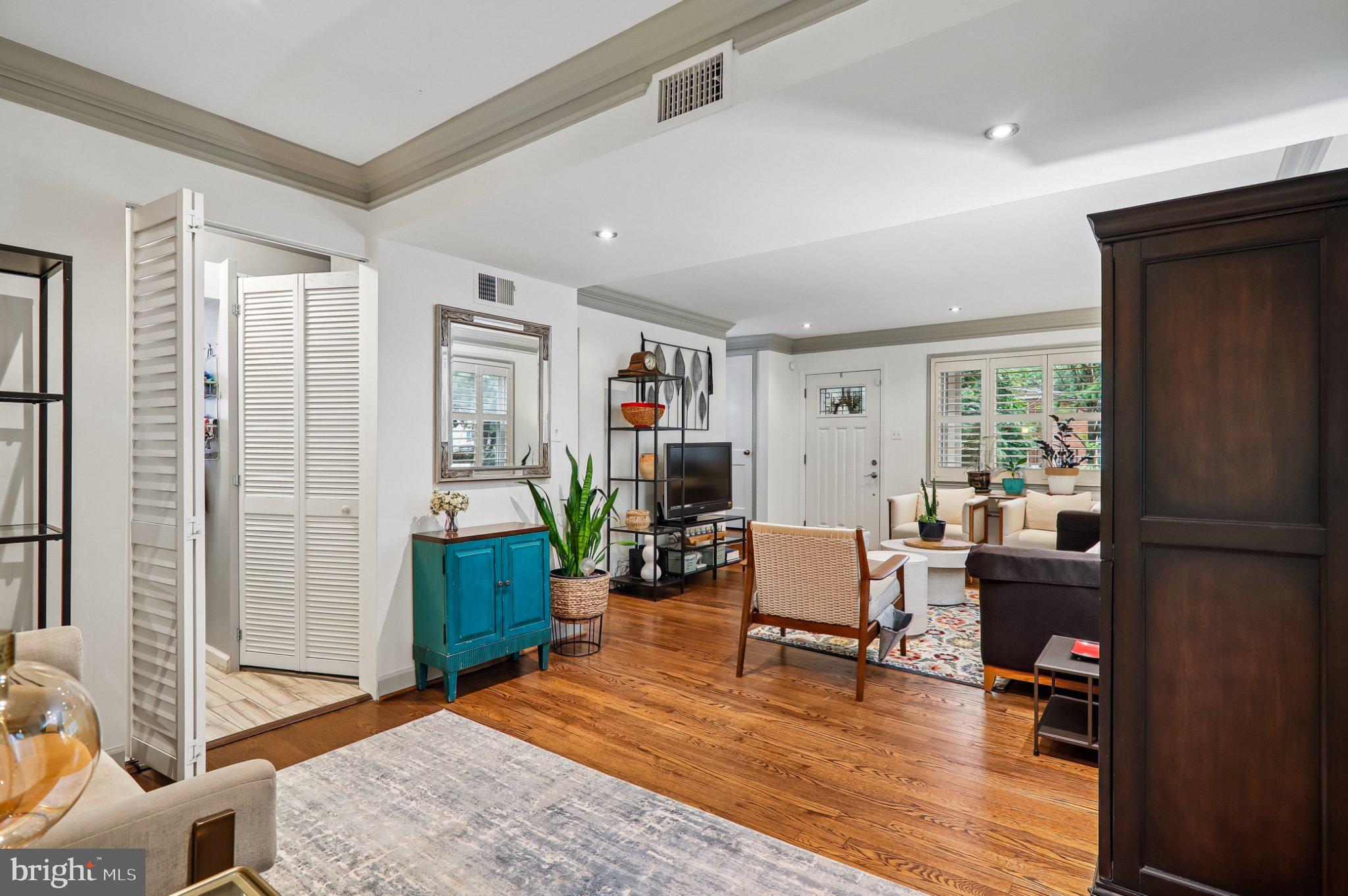 3103 Walnut Street Northeast Washington, DC 20018 - Photo 9 of 40 Charming living space with warm tones.