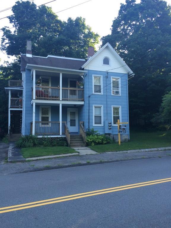 173 Riverside Avenue Torrington, CT 06790 - Photo 1 of 1 a front view of a house with a yard