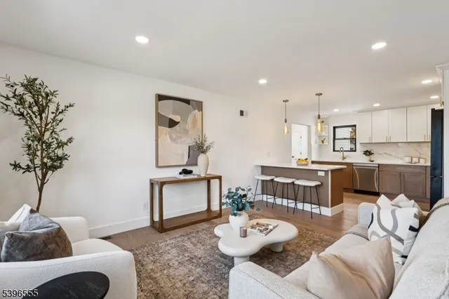 a living room with furniture and a table