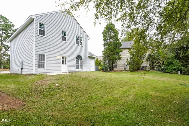 a view of a backyard with a garden