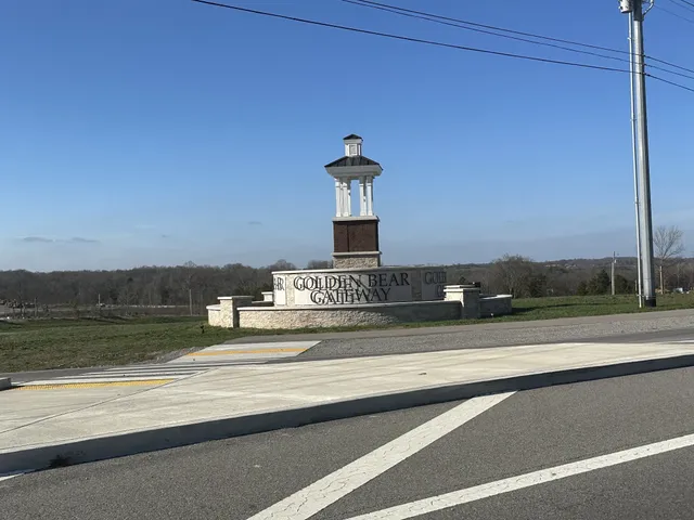 a view of a street in front of a building