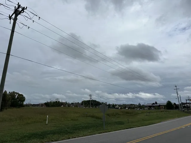 a view of a golf course with a lake