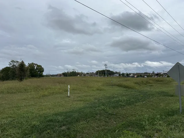 a view of lake with mountain in background