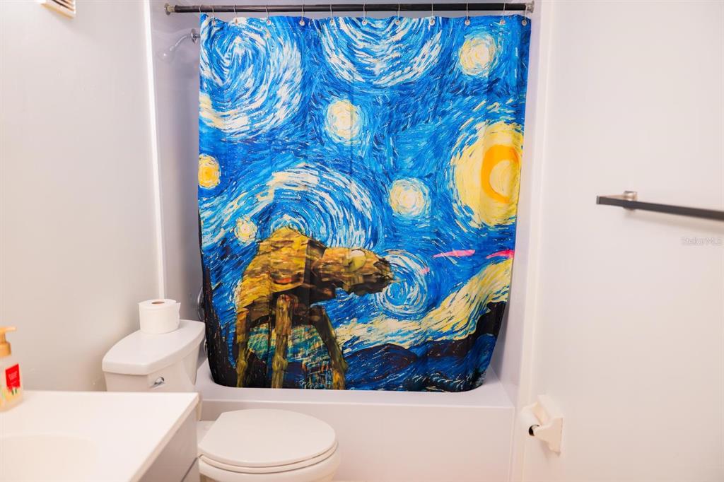 1902 Honour Road, Unit 23 Orlando, FL 32839 - Photo 15 of 19 a bathroom with a toilet and a sink