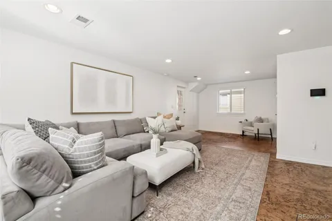 a living room with furniture and a couch
