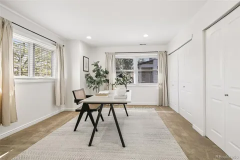 a view of a livingroom with furniture and window