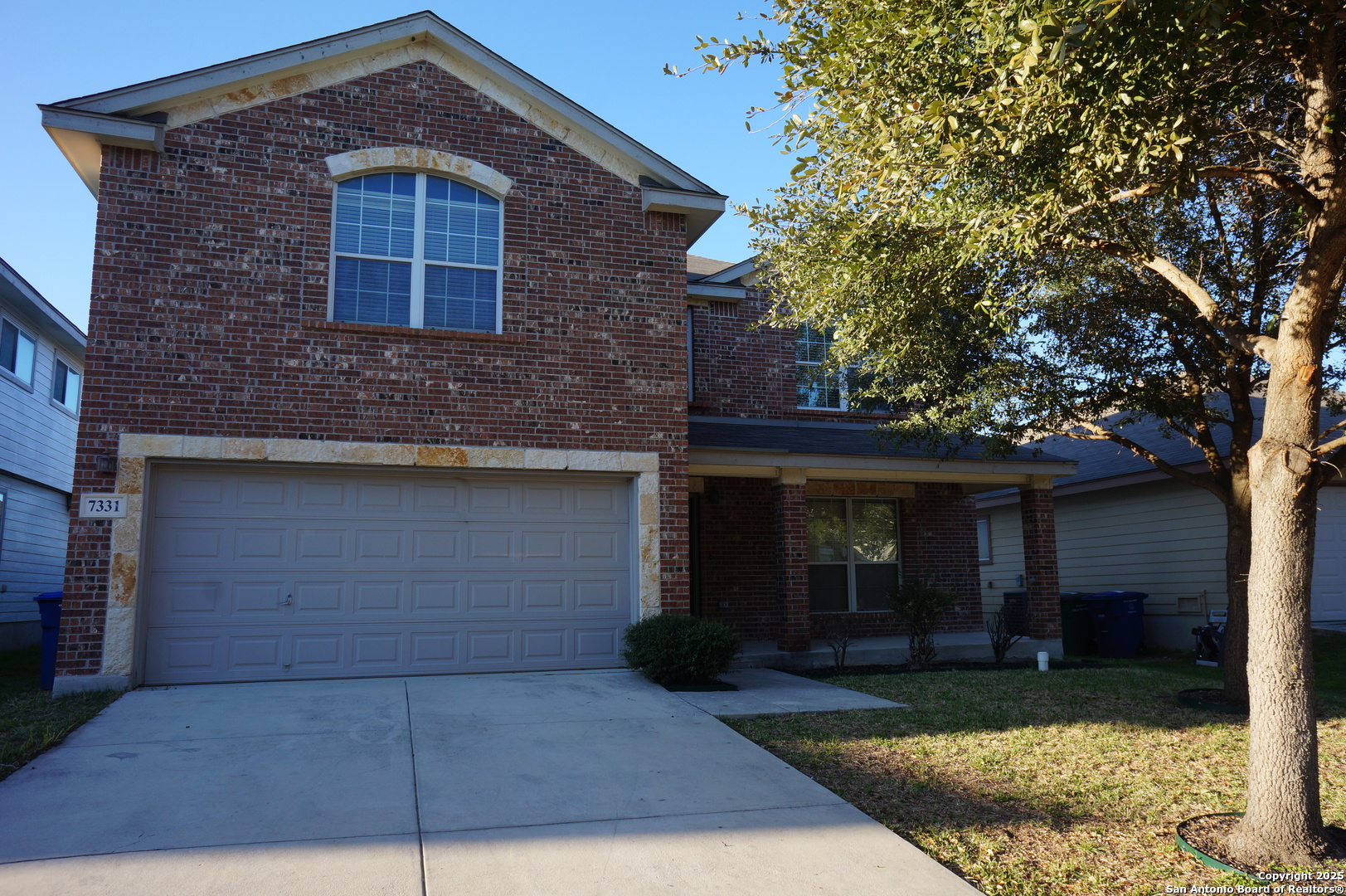 7331 Tranquillo Way San Antonio, TX 78266 - Photo 1 of 1 a front view of a house with garden