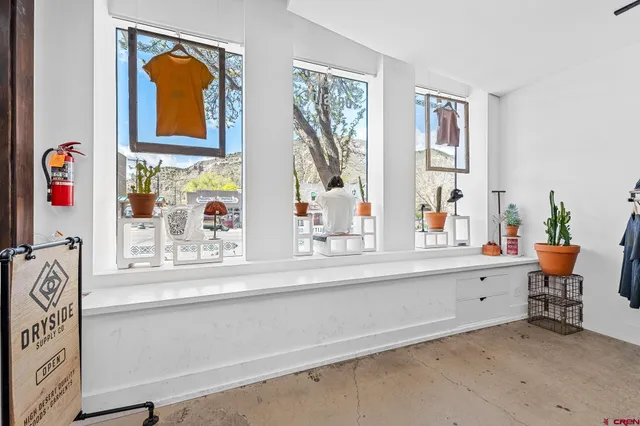 a living room with furniture and window
