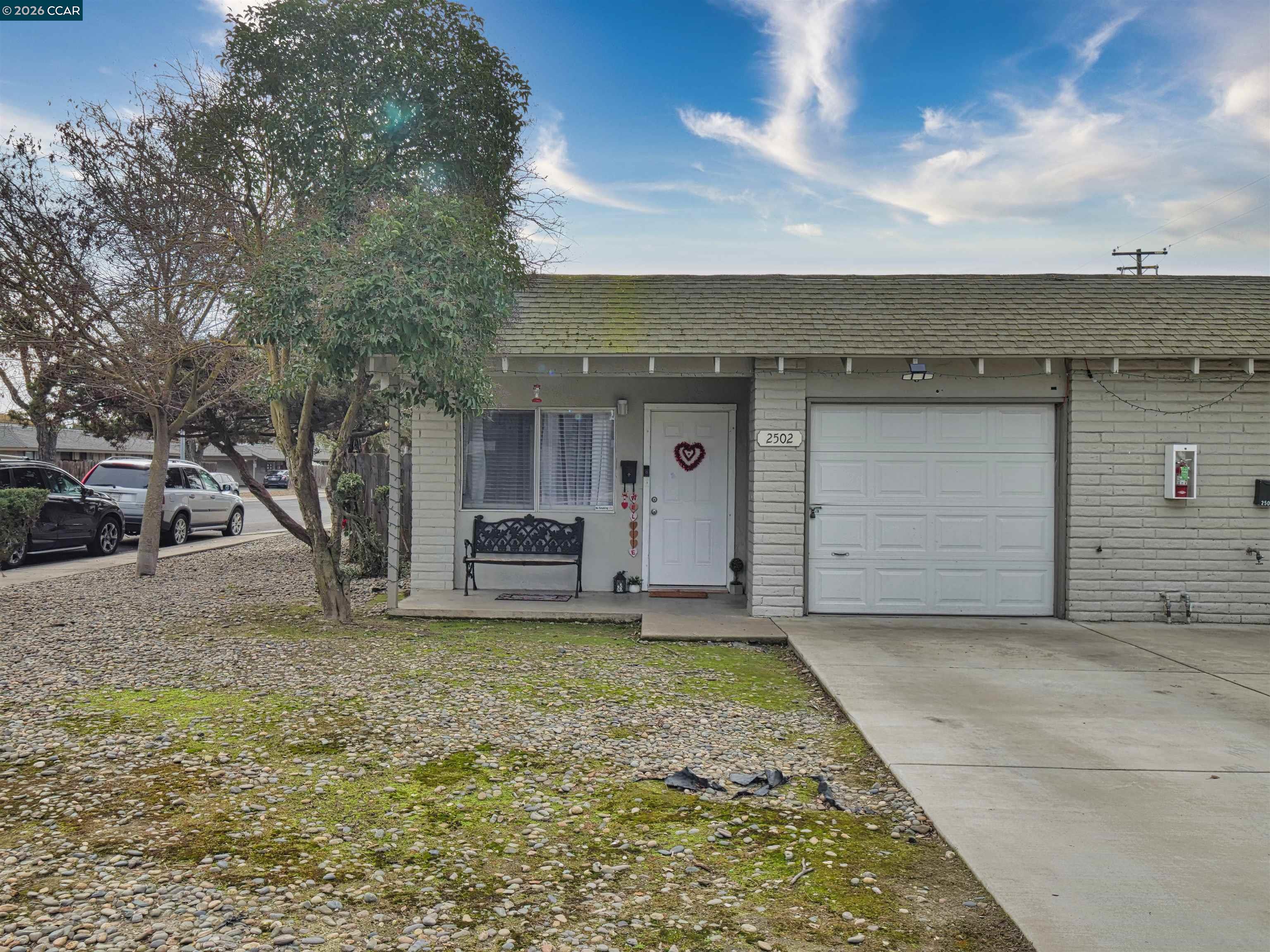 2500 Haddon Avenue Modesto, CA 95354 - Photo 11 of 35 a view of a house with a garage