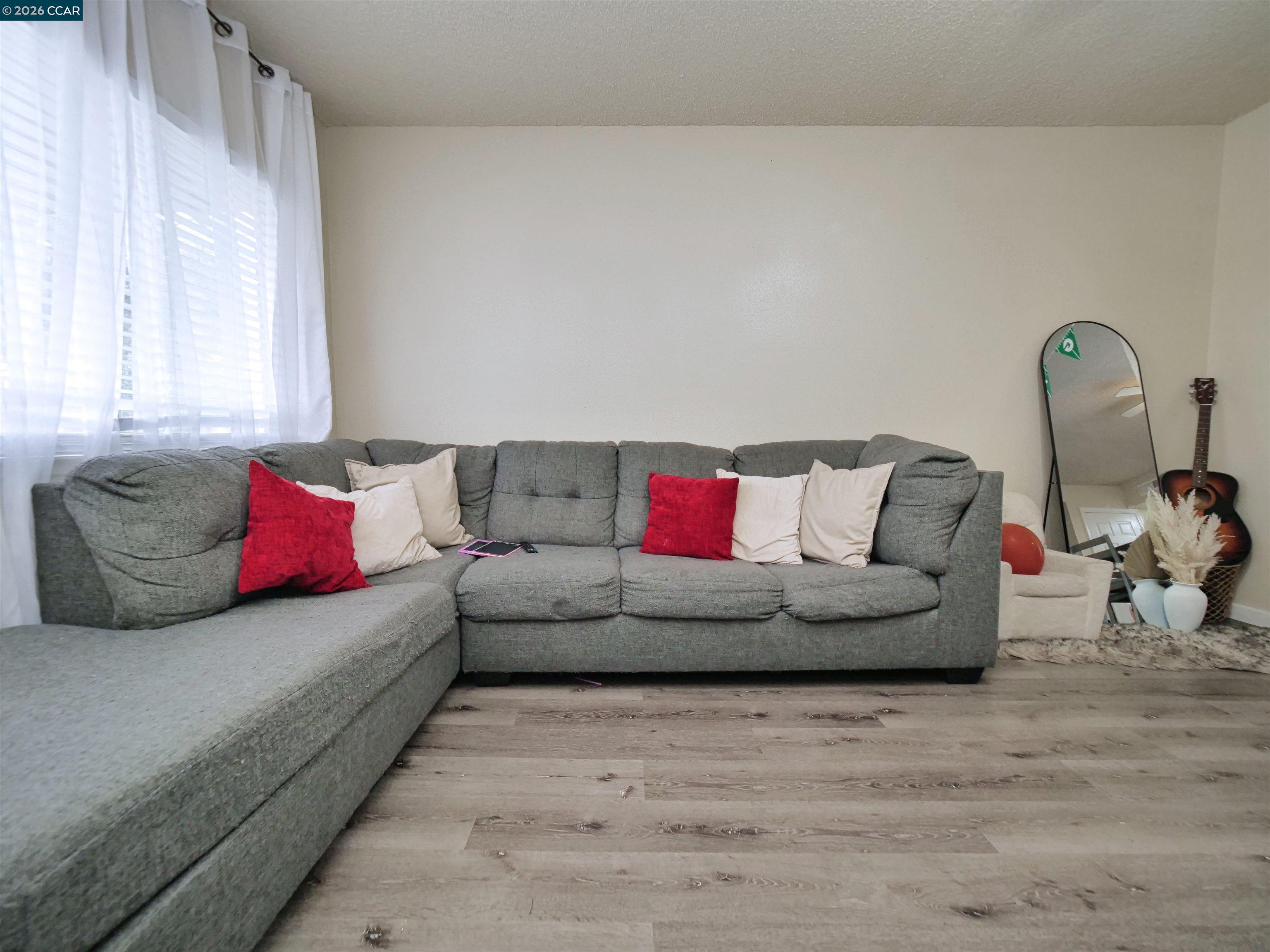 2500 Haddon Avenue Modesto, CA 95354 - Photo 18 of 37 a living room with furniture and a couch