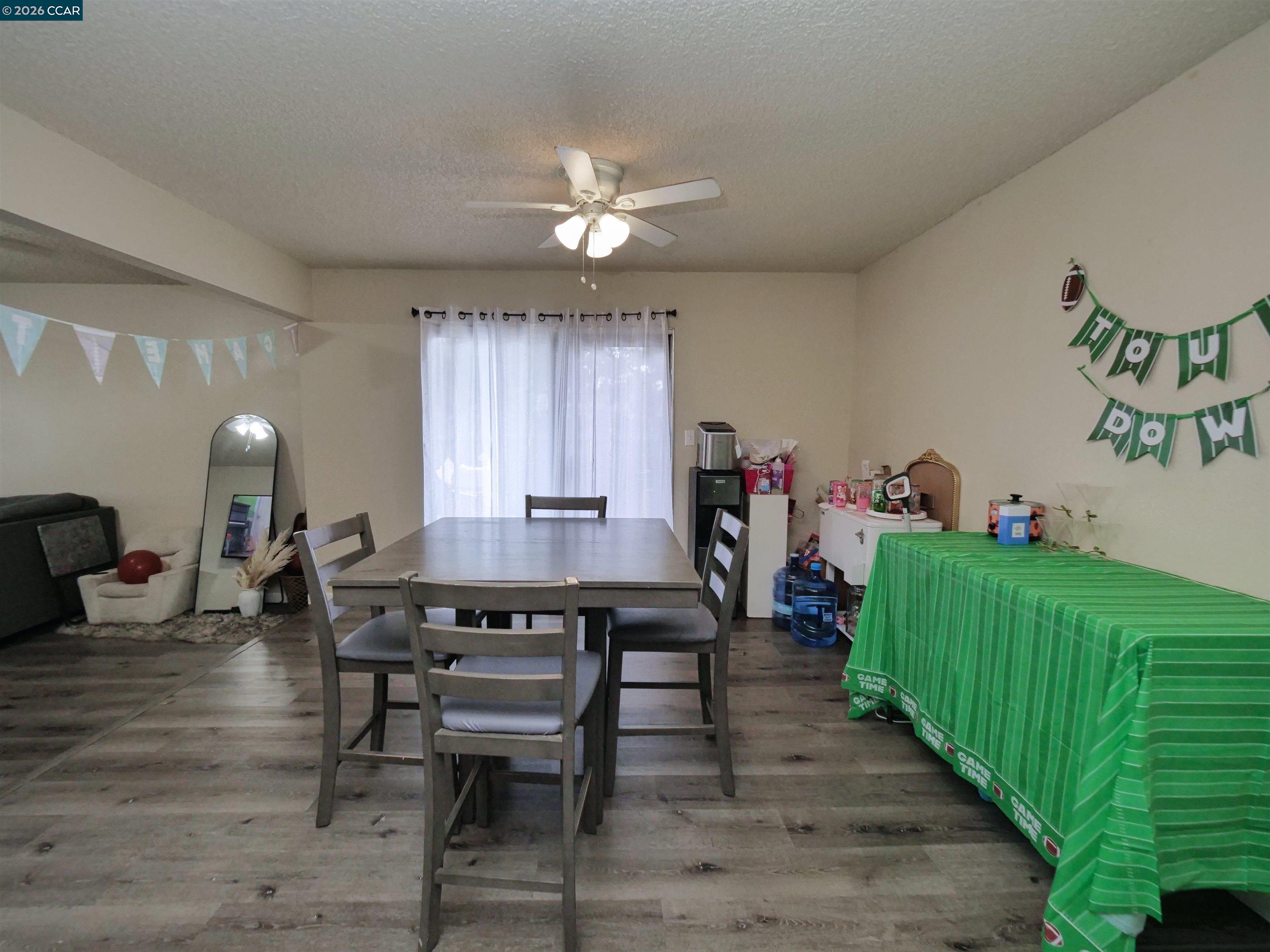 2500 Haddon Avenue Modesto, CA 95354 - Photo 22 of 37 a view of a dining room with furniture and wooden floor
