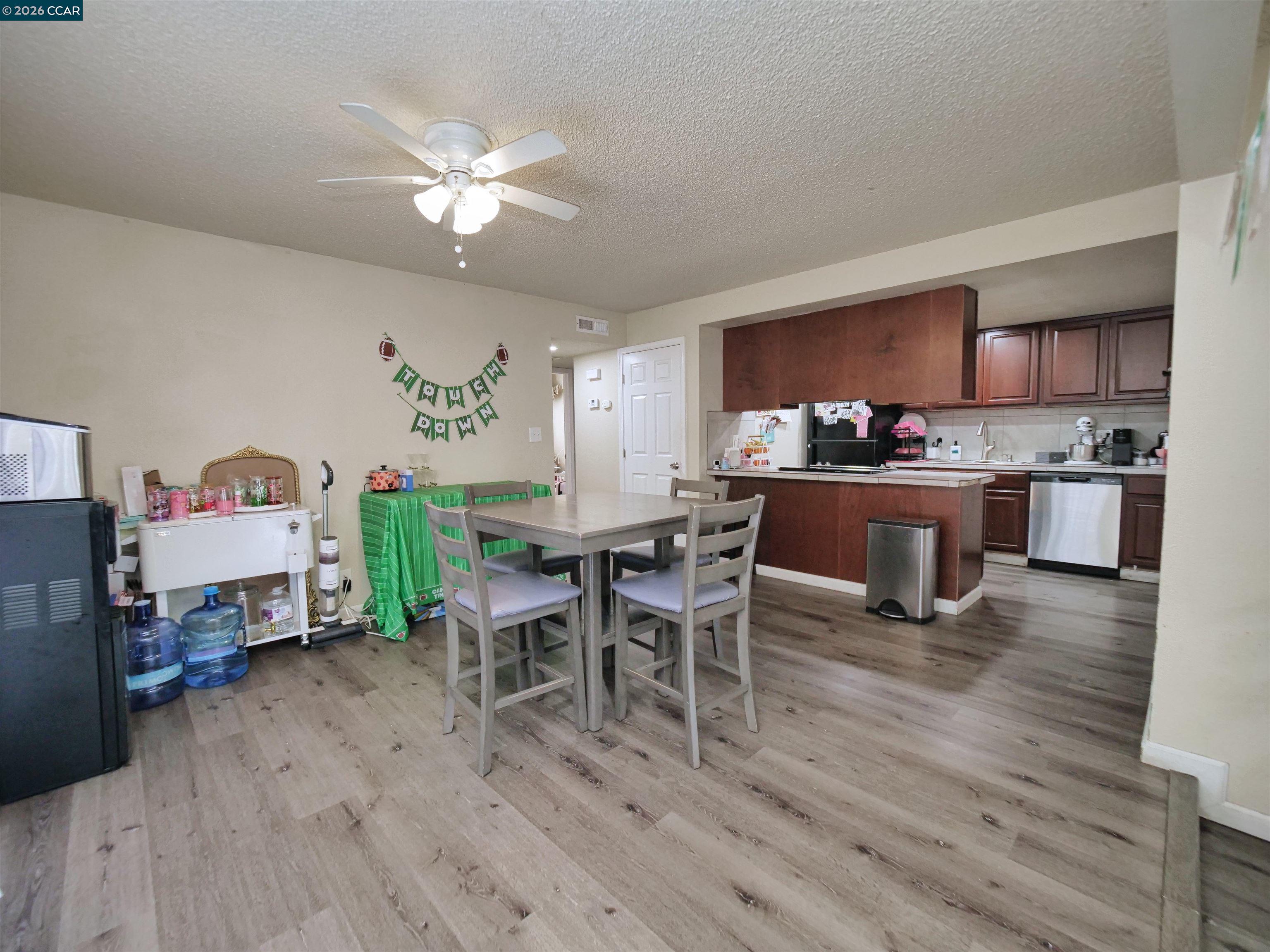 2500 Haddon Avenue Modesto, CA 95354 - Photo 22 of 35 a living room with furniture and kitchen view