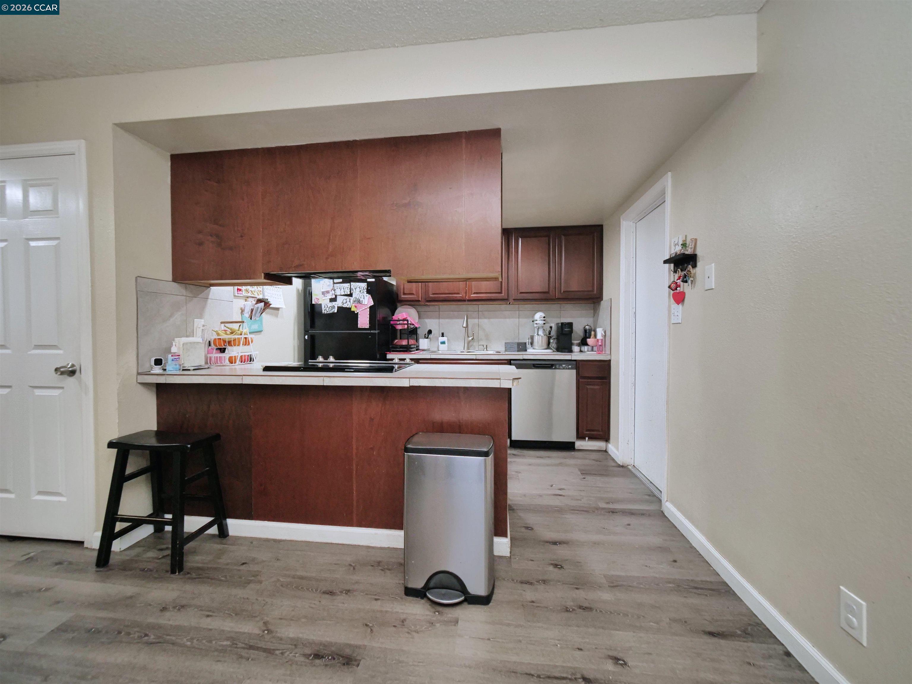 2500 Haddon Avenue Modesto, CA 95354 - Photo 23 of 35 a kitchen with a sink cabinets and window