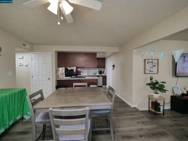 a view of a dining room with furniture