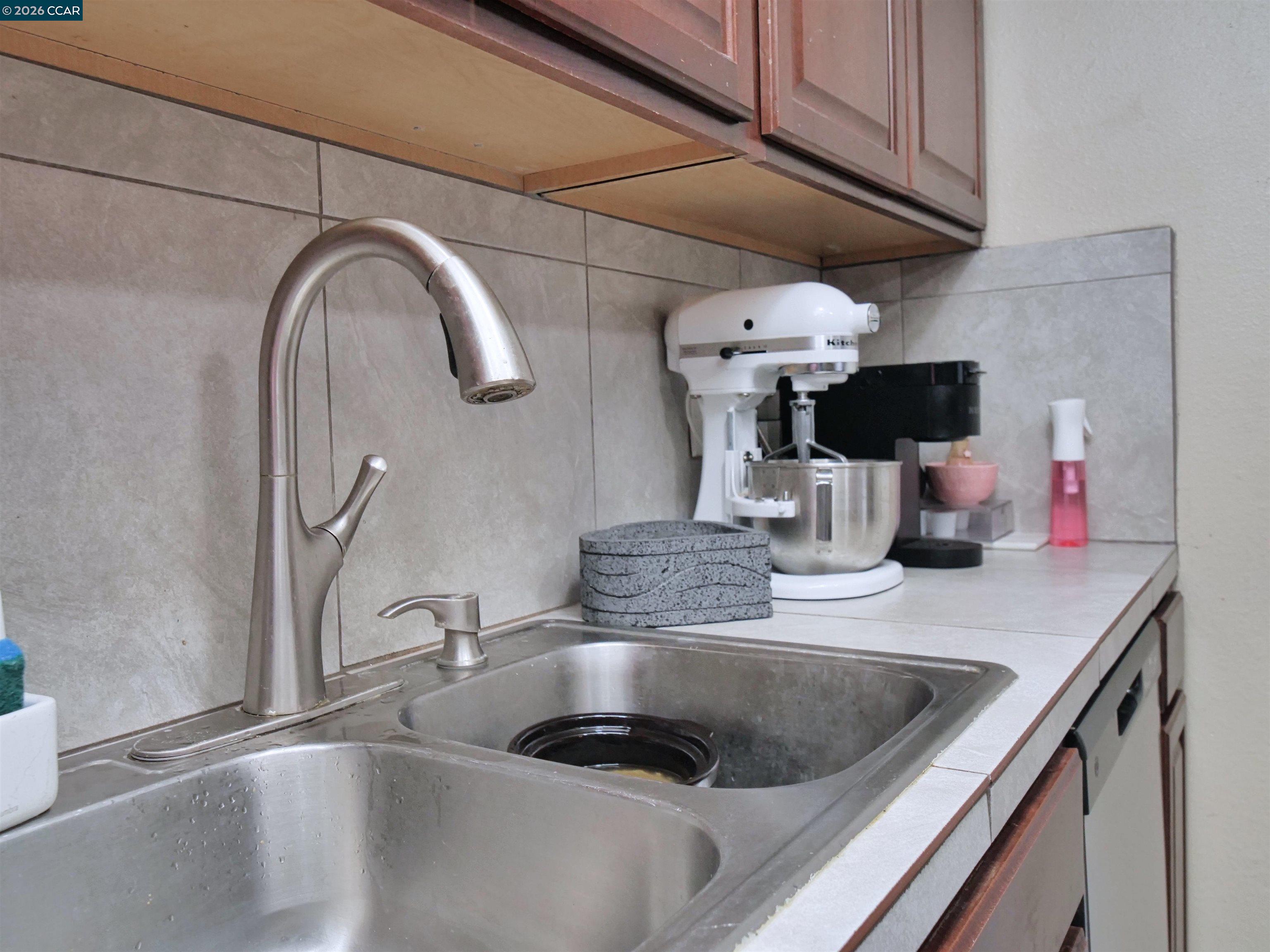 2500 Haddon Avenue Modesto, CA 95354 - Photo 28 of 37 a kitchen with a sink and a stove