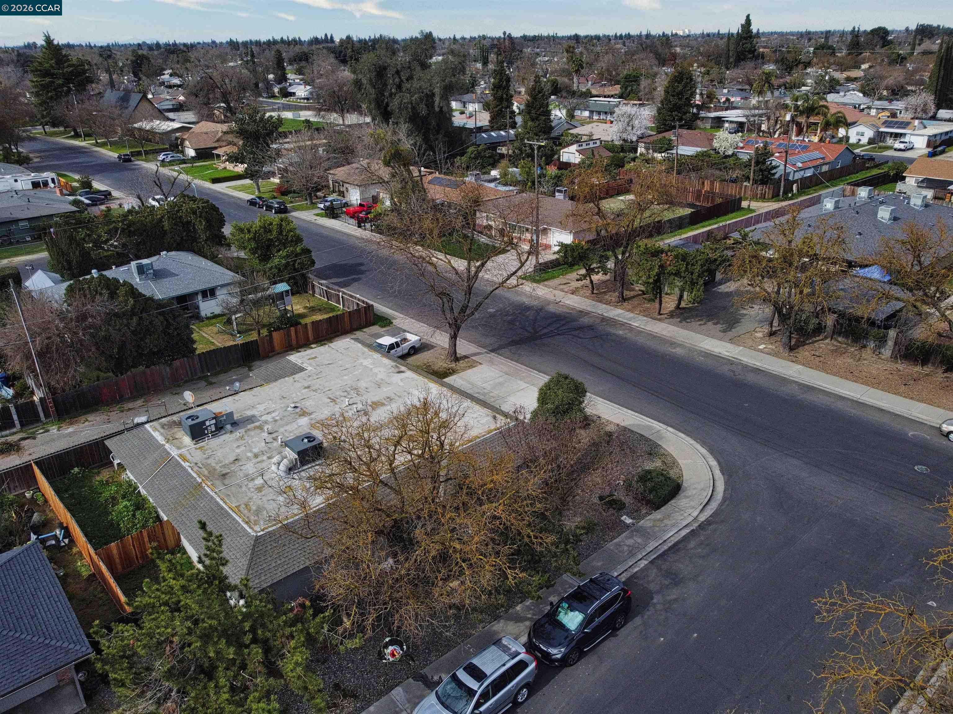 2500 Haddon Avenue Modesto, CA 95354 - Photo 33 of 35 an aerial view of a house with a yard lake view