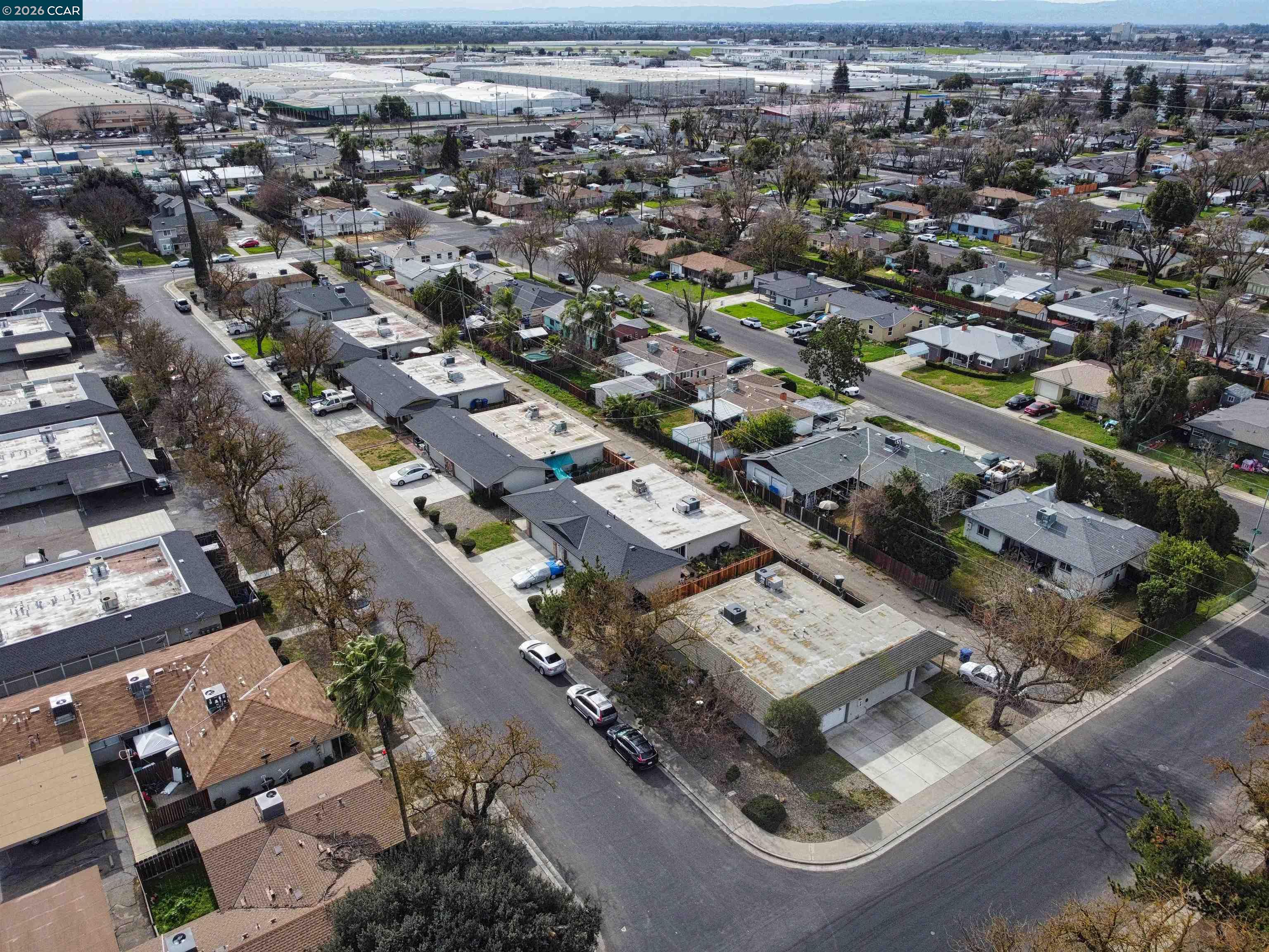 2500 Haddon Avenue Modesto, CA 95354 - Photo 34 of 35 an aerial view of a city with parking