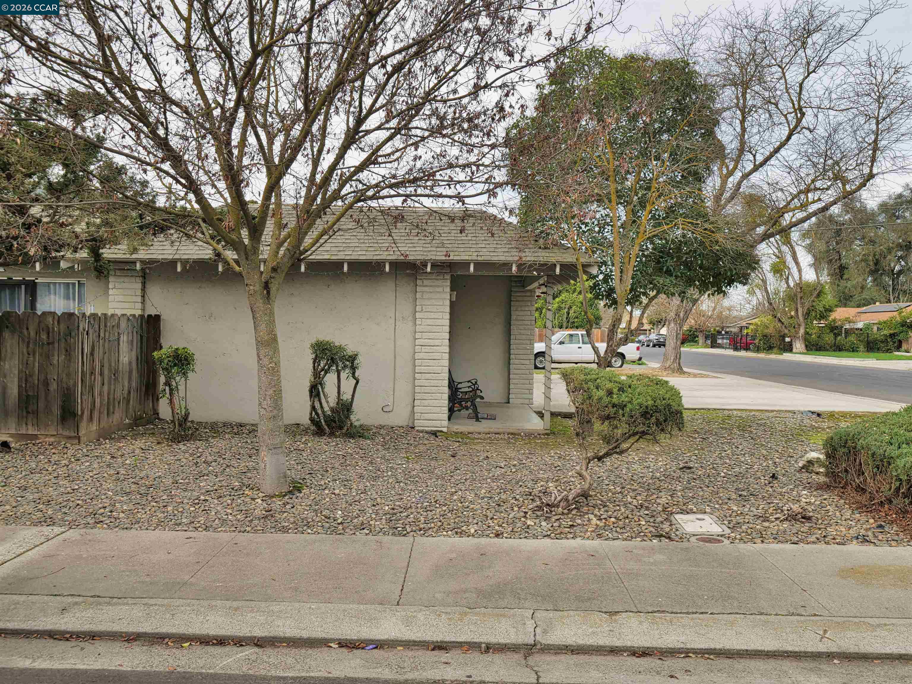 2500 Haddon Avenue Modesto, CA 95354 - Photo 4 of 37 a front view of a house with garden