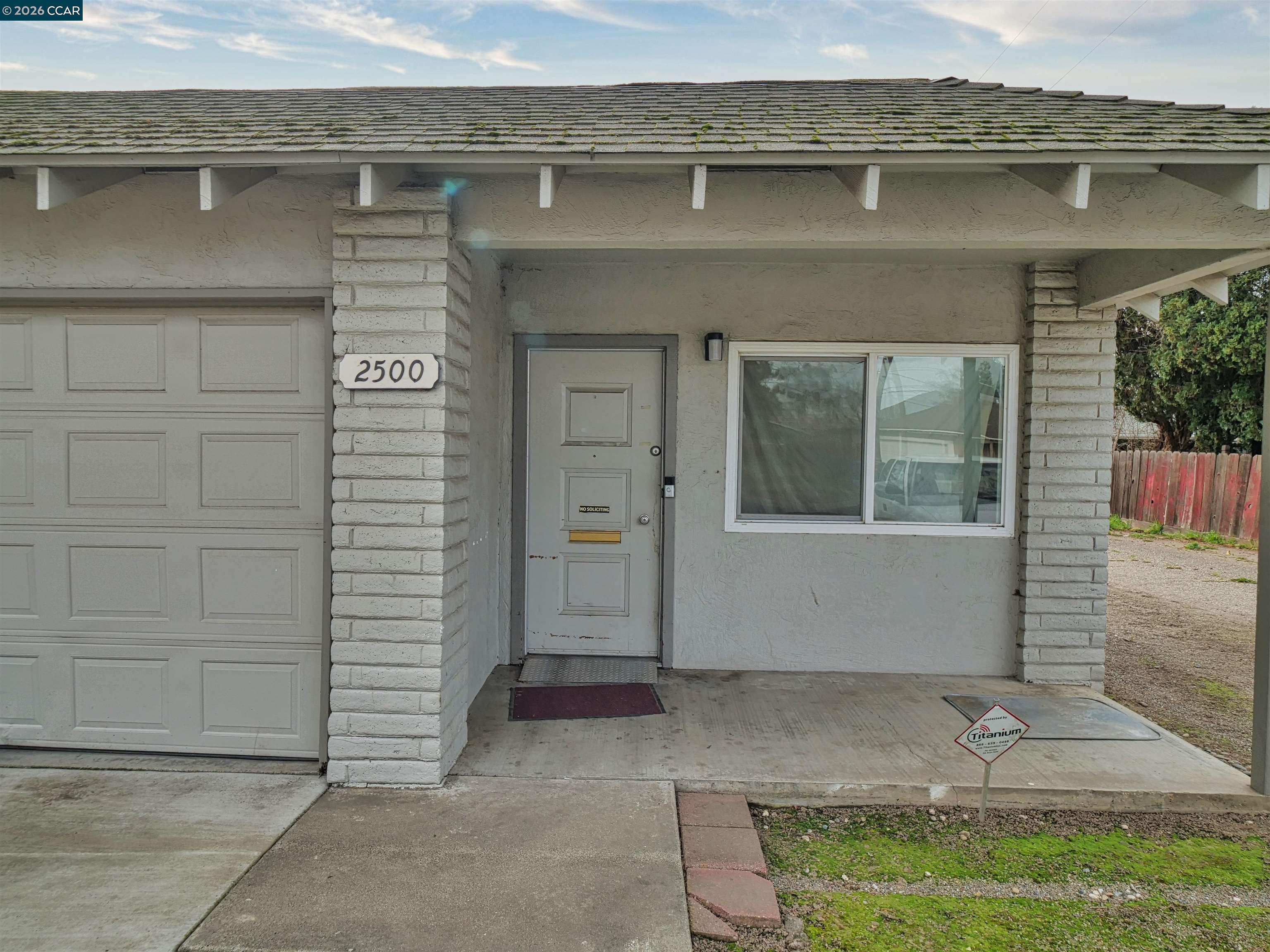2500 Haddon Avenue Modesto, CA 95354 - Photo 8 of 37 a view of front door of house