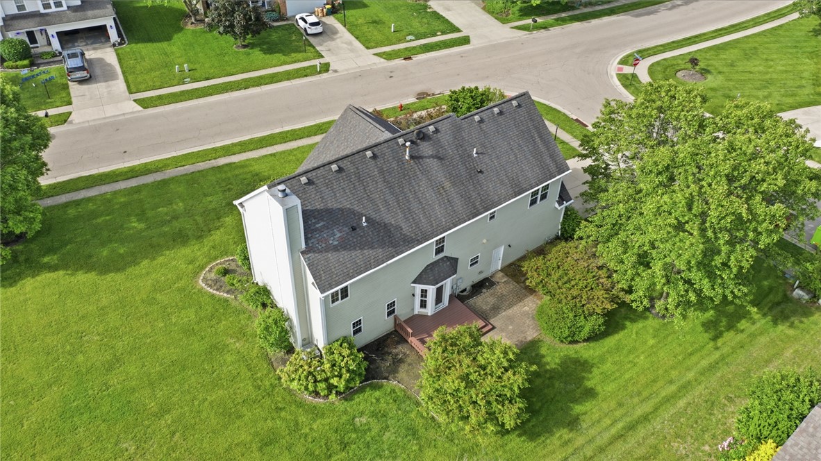 10 Chase Court Springboro, OH 45066 - Photo 2 of 75 An aerial perspective reveals the residential structure's exterior and expansive surroundings.