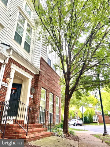 a view of a building with a tree