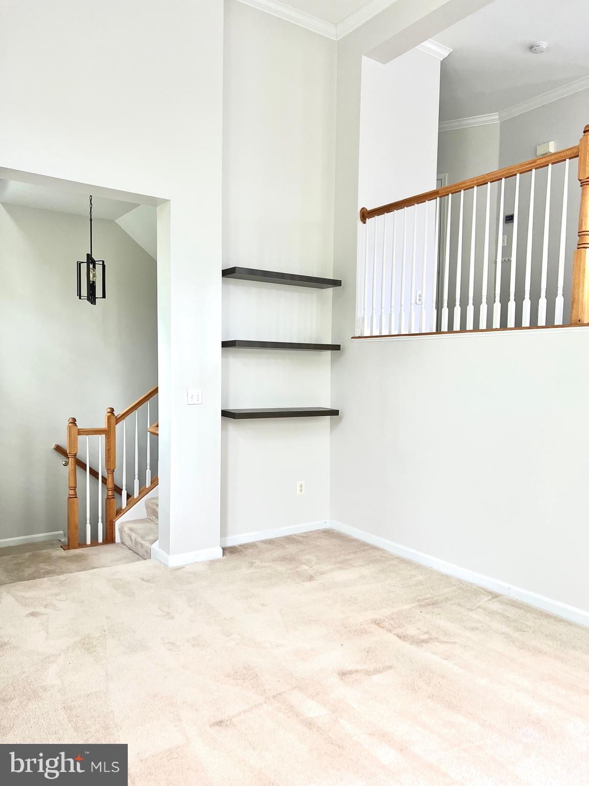 14468 Village High Street, Unit 148 Gainesville, VA 20155 - Photo 5 of 14 a view of an empty room