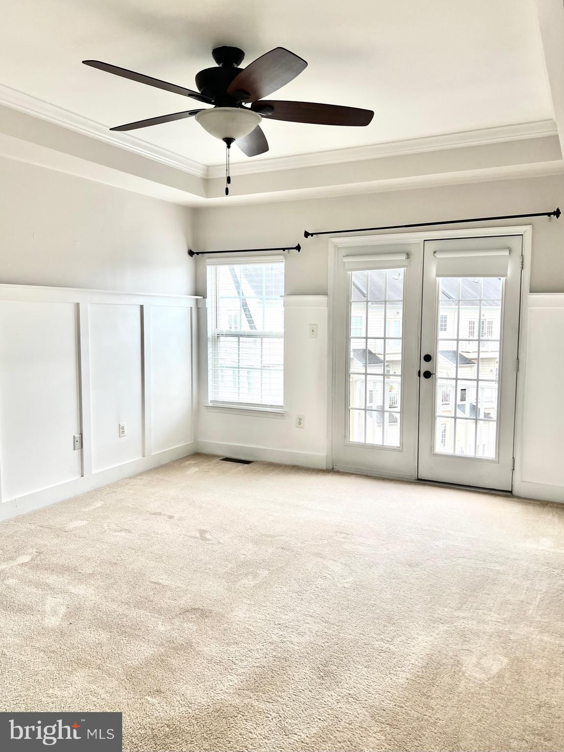 14468 Village High Street, Unit 148 Gainesville, VA 20155 - Photo 8 of 14 a view of an empty room with a window