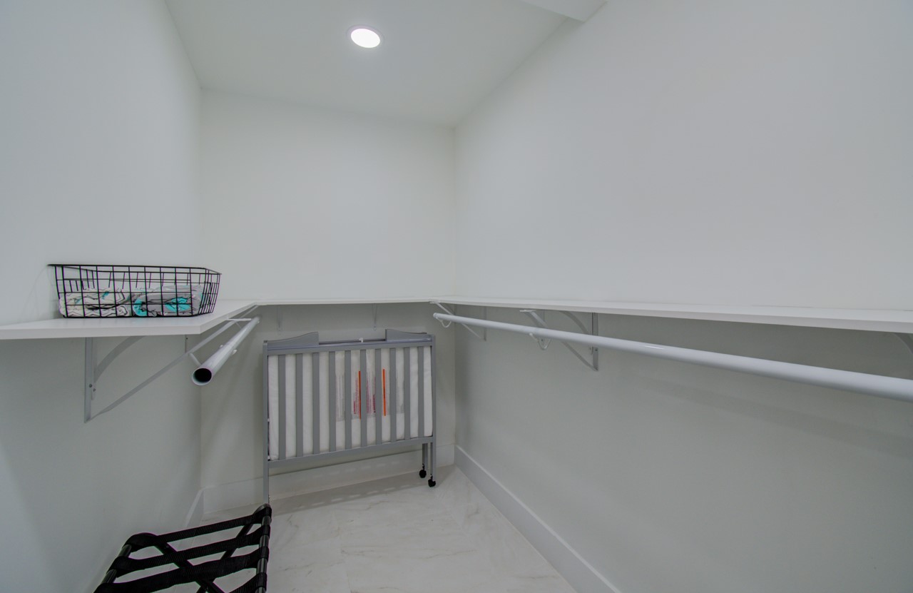 5539 Edith Street Houston, TX 77081 - Photo 17 of 50 a view of a hallway with staircase