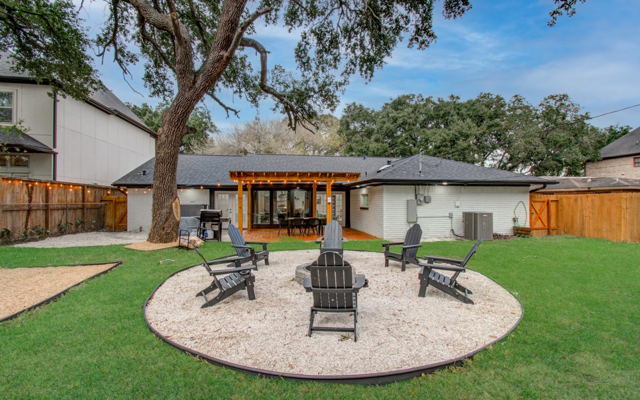 5539 Edith Street Houston, TX 77081 - Photo 40 of 50 a view of a house with backyard porch and sitting area