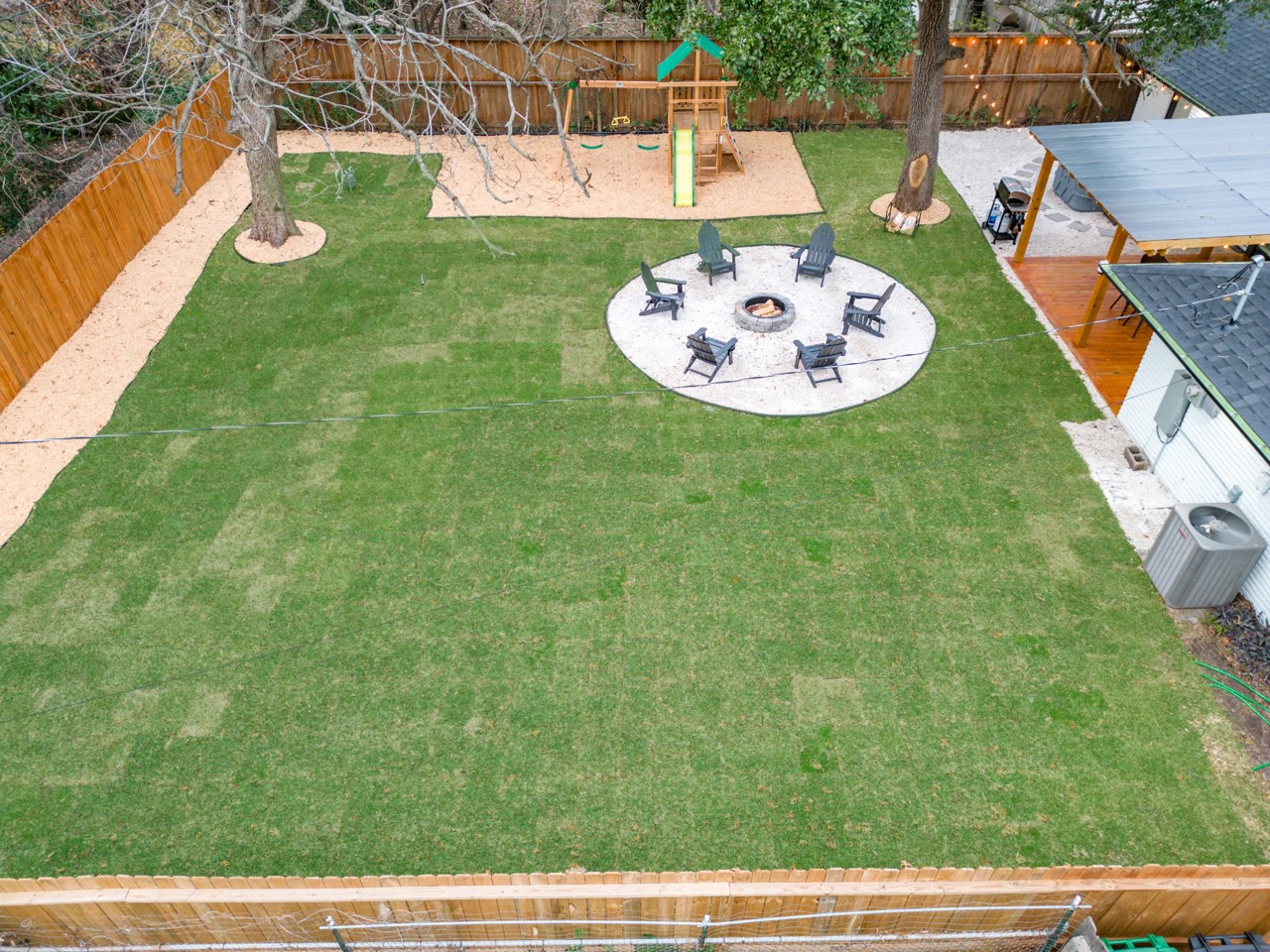 5539 Edith Street Houston, TX 77081 - Photo 48 of 50 a view of a backyard with a garden and entertaining space
