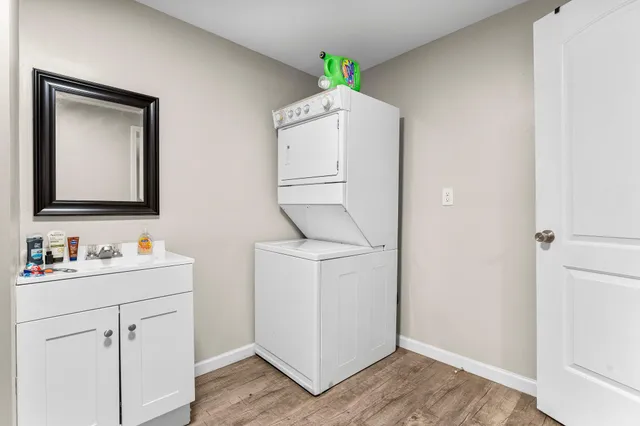 a work room with furniture and wooden floor